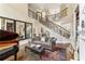 Elegant foyer showcases a grand staircase and stunning architectural details at 2310 Gracehaven Way, Lawrenceville, GA 30043