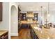 Kitchen with granite countertops, custom cabinetry, and modern appliances at 2310 Gracehaven Way, Lawrenceville, GA 30043