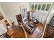 Aerial view of a well-lit living room with fireplace and piano at 2310 Gracehaven Way, Lawrenceville, GA 30043