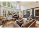 Spacious living room with high ceilings, large windows, and hardwood floors at 2310 Gracehaven Way, Lawrenceville, GA 30043