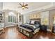 Large main bedroom with trey ceiling and plenty of natural light at 2310 Gracehaven Way, Lawrenceville, GA 30043