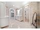 Elegant bathroom with dual vanities and direct closet access at 1790 Mountain Farm Rd, Woodstock, GA 30188
