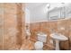 Bathroom featuring marble tiled shower and floors, classic fixtures, and a vanity at 1790 Mountain Farm Rd, Woodstock, GA 30188