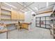 Workshop area in garage with cabinets, workbench, and tool storage at 1790 Mountain Farm Rd, Woodstock, GA 30188