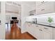 Kitchen featuring granite countertops, stainless appliances and open floor plan at 1790 Mountain Farm Rd, Woodstock, GA 30188