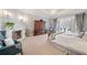 Spacious main bedroom suite with fireplace and sitting area at 1790 Mountain Farm Rd, Woodstock, GA 30188