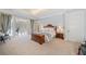 Bright main bedroom featuring neutral walls and access to sunroom at 1790 Mountain Farm Rd, Woodstock, GA 30188
