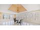 Bright sunroom featuring many windows and a decorative chandelier at 1790 Mountain Farm Rd, Woodstock, GA 30188