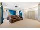 Home movie theater with reclining leather seats, projector screen, and storage closets at 1790 Mountain Farm Rd, Woodstock, GA 30188