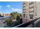 Balcony view of the building and the surrounding neighborhood at 2626 Peachtree Nw Rd # 704, Atlanta, GA 30305