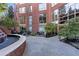 Building courtyard featuring a fountain and patio seating areas at 2626 Peachtree Nw Rd # 704, Atlanta, GA 30305