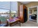 Bright dining area near the window with views and adjacent to the kitchen and living room at 2626 Peachtree Nw Rd # 704, Atlanta, GA 30305