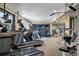 Well-equipped gym featuring treadmills, elliptical machines, and weight training equipment at 2626 Peachtree Nw Rd # 704, Atlanta, GA 30305