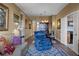 Comfortable living area with cozy furnishings, decor, and a view leading into the dining room and open kitchen space at 2626 Peachtree Nw Rd # 704, Atlanta, GA 30305