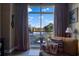 Relaxing living room area with a view, comfortable seating, curtains, and decor creating a cozy and bright atmosphere at 2626 Peachtree Nw Rd # 704, Atlanta, GA 30305