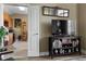 Cozy living room with hardwood floors, TV, and open doorway to kitchen at 2626 Peachtree Nw Rd # 704, Atlanta, GA 30305