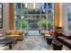 Inviting lobby with comfortable seating and a view of the courtyard at 2626 Peachtree Nw Rd # 704, Atlanta, GA 30305