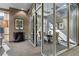 Well-lit conference room with glass doors, a table, and a view from the window, creating a bright and open space at 2626 Peachtree Nw Rd # 704, Atlanta, GA 30305