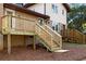 Exterior view of house with multiple decks and steps in backyard at 2542 Maclaren Cir, Dunwoody, GA 30360