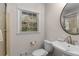 Bathroom featuring white fixtures, neutral walls and a large window at 2542 Maclaren Cir, Dunwoody, GA 30360