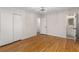 Bedroom featuring hardwood floors and an ensuite bathroom at 2542 Maclaren Cir, Dunwoody, GA 30360