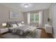 Bedroom with a decorative bed, carpet, a window and a ceiling fan at 2542 Maclaren Cir, Dunwoody, GA 30360