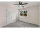 Neutral bedroom with ceiling fan, ample natural light, and wall-to-wall carpeting at 2542 Maclaren Cir, Dunwoody, GA 30360