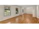 Dining room featuring hardwood floors, a chandelier, and natural light from windows at 2542 Maclaren Cir, Dunwoody, GA 30360