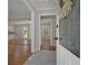 Welcoming entryway with marble tile floors and views of the kitchen and living spaces at 2542 Maclaren Cir, Dunwoody, GA 30360