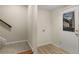 Hallway with stairs and entrance to backyard at 2542 Maclaren Cir, Dunwoody, GA 30360