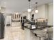 Spacious kitchen features marble tile floor, granite countertops and stainless steel appliances at 2542 Maclaren Cir, Dunwoody, GA 30360