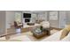 Bright living room with fireplace, modern decor, hardwood floors, and an open layout for comfortable living and entertaining at 2542 Maclaren Cir, Dunwoody, GA 30360