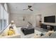 Bright living room with ceiling fan, plush seating, and stylish decor, perfect for relaxation at 2542 Maclaren Cir, Dunwoody, GA 30360