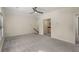 Spacious loft area with vaulted ceilings, neutral carpet and doorway to kitchenette at 2542 Maclaren Cir, Dunwoody, GA 30360