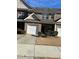 Inviting brick townhouse with attached garage and well-maintained landscaping at 2555 Flat Shoals Rd # 2006, Atlanta, GA 30349