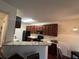 Efficient kitchen featuring granite countertops, modern appliances, and ample cabinet space at 2555 Flat Shoals Rd # 2006, Atlanta, GA 30349