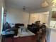 Cozy living room featuring plush sofas, area rug, and seamless flow to the dining area at 2555 Flat Shoals Rd # 2006, Atlanta, GA 30349