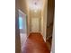 Inviting foyer with hardwood floors, neutral walls and a view of the staircase at 6396 Phillips Ct, Lithonia, GA 30058