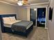 Cozy bedroom with a comfortable bed and a private balcony at 795 Hammond Dr # 813, Sandy Springs, GA 30328