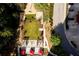 Aerial view of a dog park with green spaces and seating areas within a fenced recreational area at 795 Hammond Dr # 813, Sandy Springs, GA 30328
