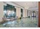 Elegant lobby with high ceilings, stylish lighting, large windows, and comfortable seating for residents and guests at 795 Hammond Dr # 813, Sandy Springs, GA 30328
