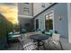 Charming outdoor patio with comfortable seating, a fire pit, and a serene atmosphere for entertaining at 795 Hammond Dr # 813, Sandy Springs, GA 30328