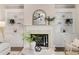 Close up of the living room fireplace and built in shelves at 11894 Aspen Forest Dr, Johns Creek, GA 30005