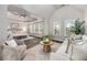 Open-concept living space connects the bedroom and sitting area for relaxation at 11894 Aspen Forest Dr, Johns Creek, GA 30005