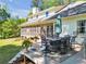 Outdoor entertaining deck features a large table with seating, perfect for enjoying backyard views at 161 Amy Ln, Canton, GA 30115