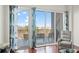 Balcony with chairs and a scenic view is accessible through sliding glass doors, and is perfect for relaxation at 2950 Mount Wilkinson Se Pkwy # 505, Atlanta, GA 30339