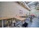 Large craft room featuring workbenches, stools, and ample space for creative projects at 2950 Mount Wilkinson Se Pkwy # 505, Atlanta, GA 30339