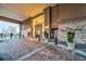 Building entrance featuring brick facade, elegant lighting, and covered drop-off area at 2950 Mount Wilkinson Se Pkwy # 505, Atlanta, GA 30339