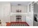 Bright kitchen featuring stainless steel appliances, ample cabinet space, subway tile backsplash, and granite countertops at 2950 Mount Wilkinson Se Pkwy # 505, Atlanta, GA 30339