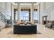 Grand lobby with soaring ceilings, modern seating and elegant staircase at 2950 Mount Wilkinson Se Pkwy # 505, Atlanta, GA 30339